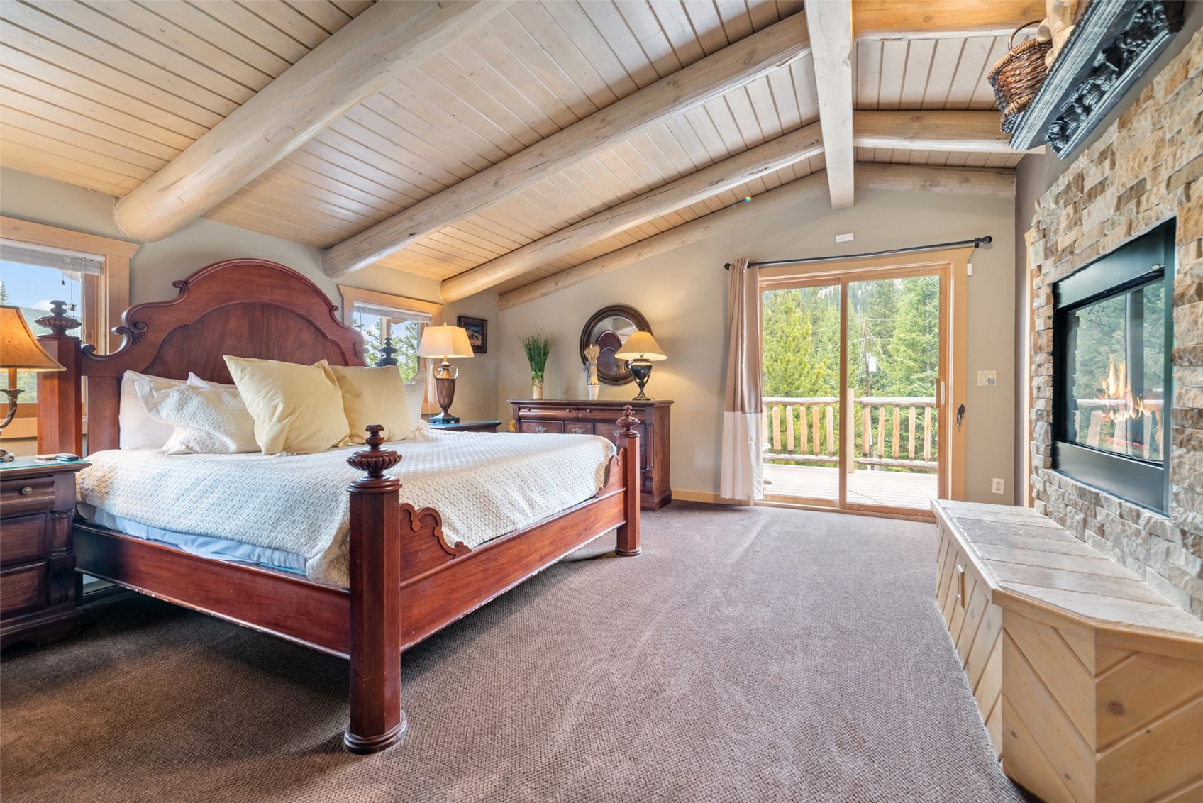 243 Rena Road Breckenridge, CO 80424 - Photo 12 of 50 Bedroom with carpet flooring, lofted ceiling with beams, and access to exterior