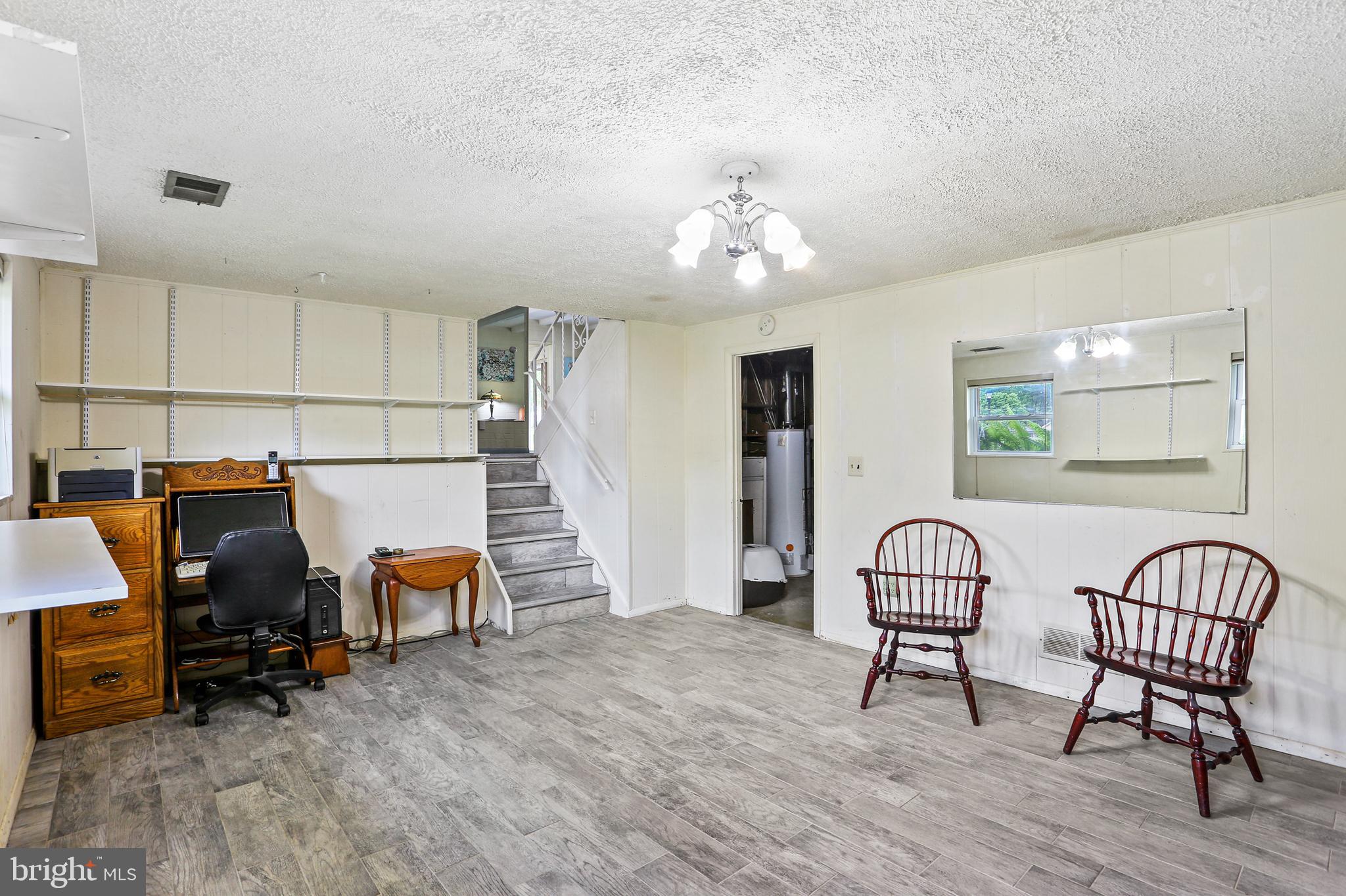 3035 Tarpon Road Riva, MD 21140 - Photo 22 of 31 a view of a workspace with furniture and lounge chair