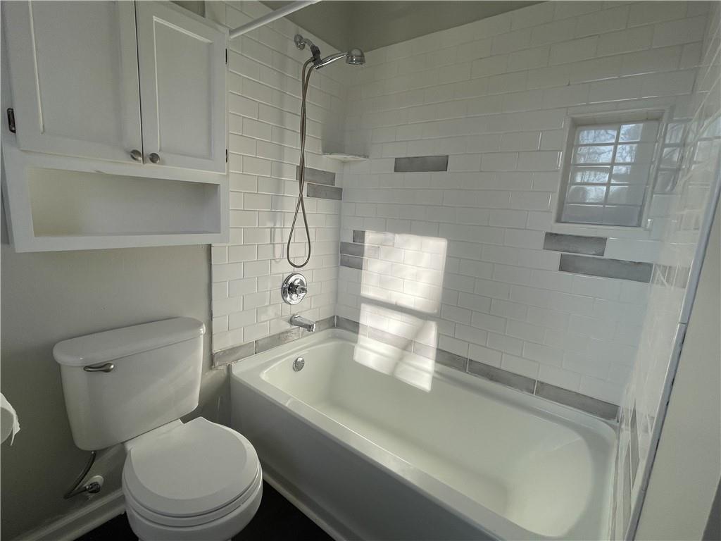 3492 Point View Circle Gainesville, GA 30506 - Photo 32 of 67 a bathroom with a sink a toilet and shower