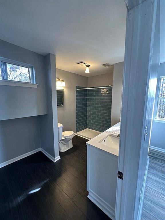 3492 Point View Circle Gainesville, GA 30506 - Photo 39 of 67 a very nice looking room with wooden floor and a window