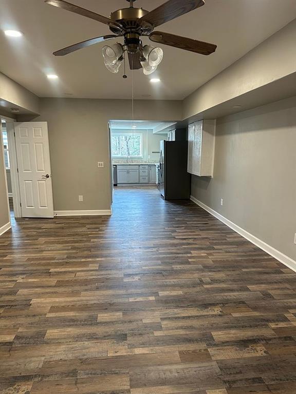 3492 Point View Circle Gainesville, GA 30506 - Photo 46 of 67 a view of an empty room with a window and wooden floor
