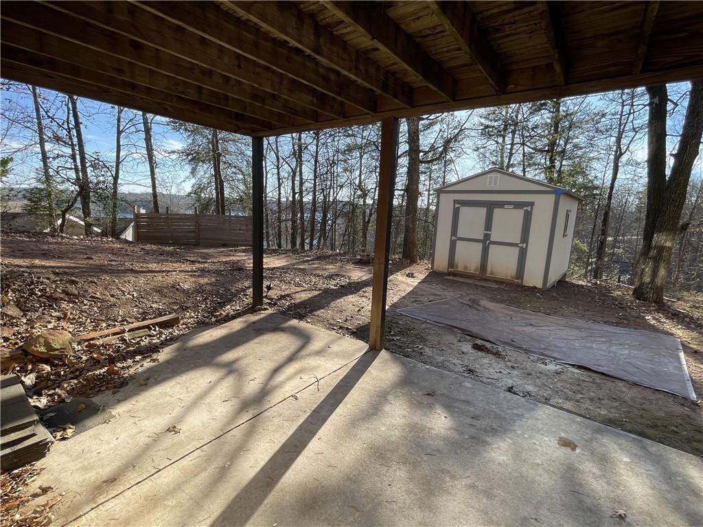 3492 Point View Circle Gainesville, GA 30506 - Photo 52 of 67 a view of a backyard with wooden floor and roof with a barbeque grill