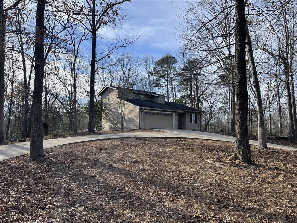 3492 Point View Circle Gainesville, GA 30506 - Photo 62 of 67 a house that has a tree in front of it