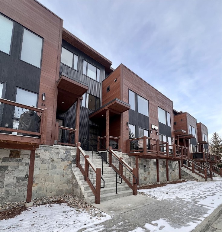 52 6th Street, Unit A4 Silverthorne, CO 80498 - Photo 2 of 15 a front view of a building with street