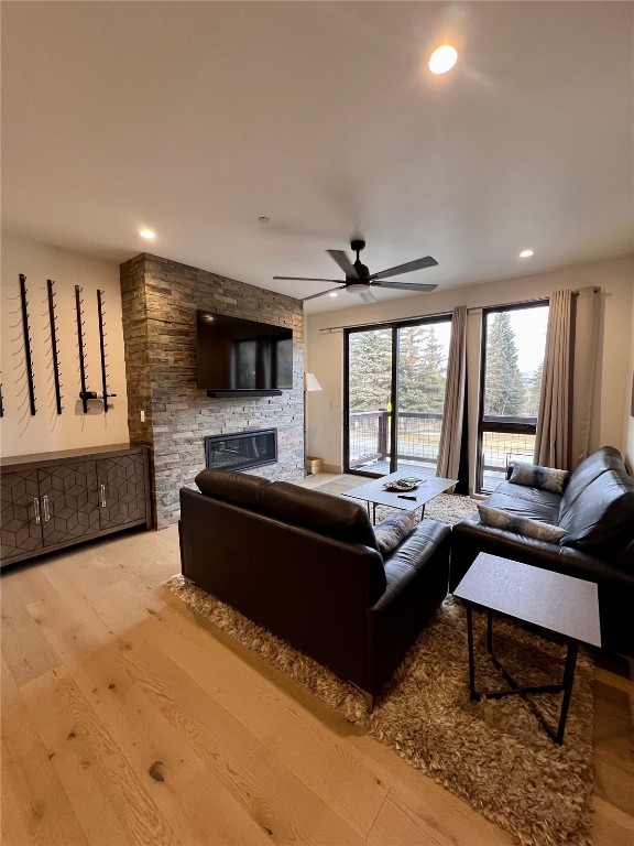 52 6th Street, Unit A4 Silverthorne, CO 80498 - Photo 5 of 15 a living room with furniture and a flat screen tv