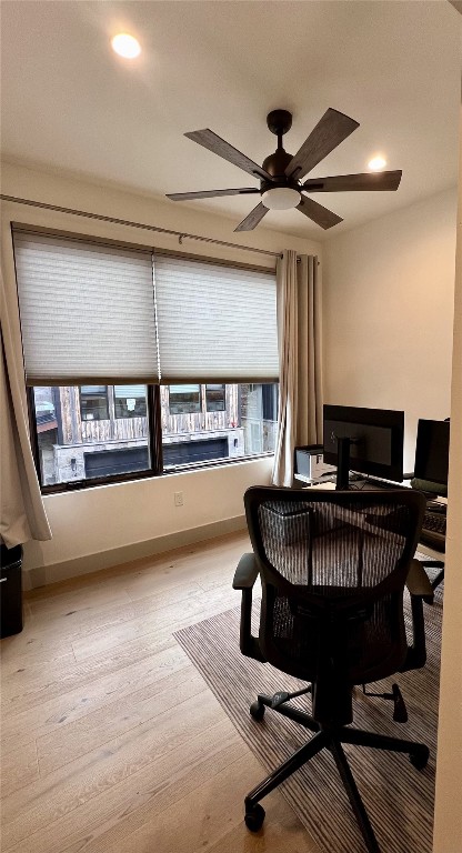 52 6th Street, Unit A4 Silverthorne, CO 80498 - Photo 8 of 15 a living room with furniture a ceiling fan and a rug