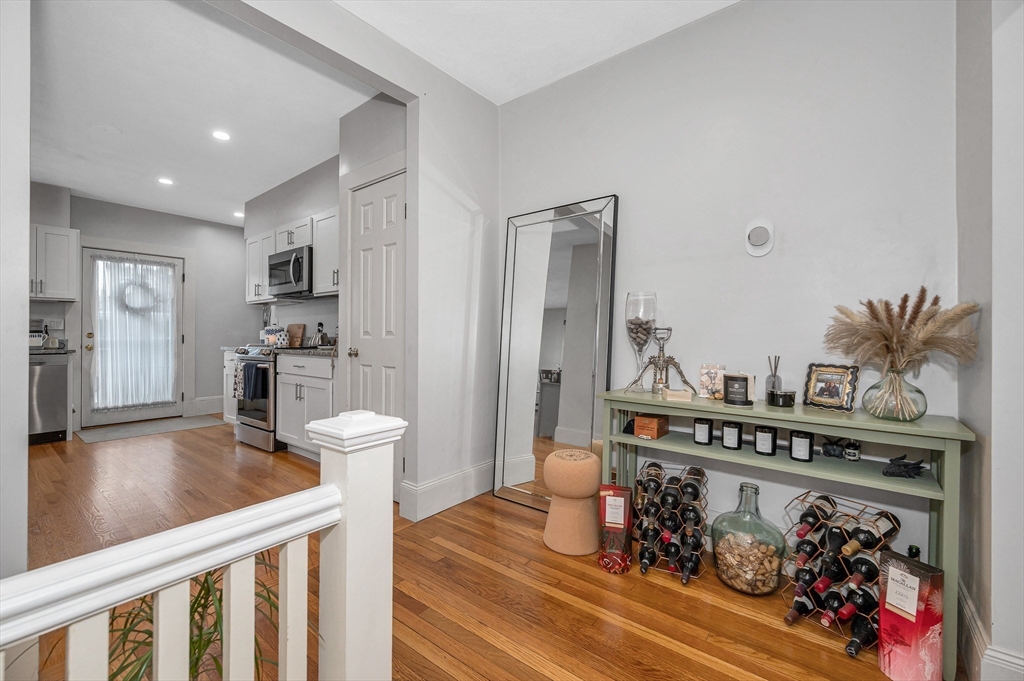 499 Humphrey Street, Unit 3 Swampscott, MA 01907 - Photo 14 of 27 a view of a living room and workspace