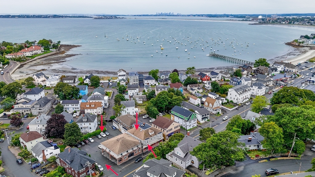 499 Humphrey Street, Unit 3 Swampscott, MA 01907 - Photo 2 of 27 an aerial view of multiple house