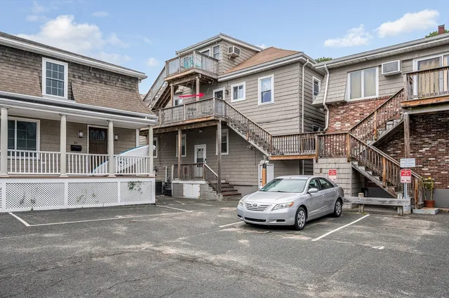 a car parked in front of a house