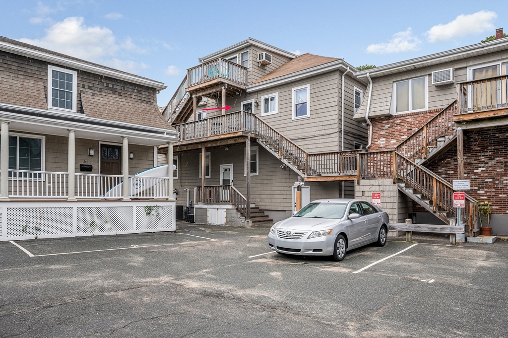 499 Humphrey Street, Unit 3 Swampscott, MA 01907 - Photo 23 of 27 a car parked in front of a house