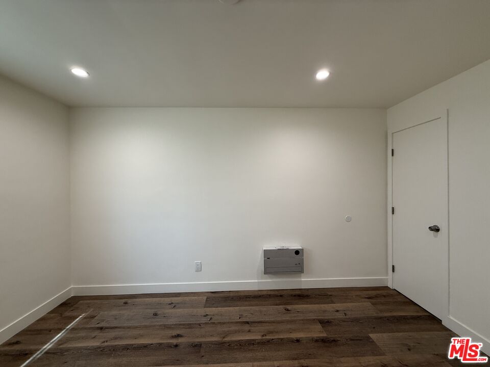 2400 Vanderbilt Lane, Unit 2402D Redondo Beach, CA 90278 - Photo 32 of 34 a view of room with wooden floor