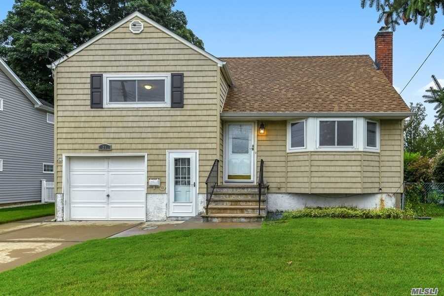 21 Northgate Road Massapequa Park, NY 11762 - Photo 1 of 1 a view of a house with a yard