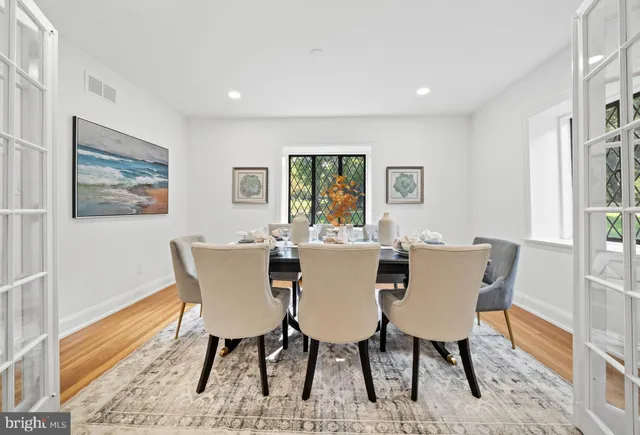 a bedroom with a bed and a lamp