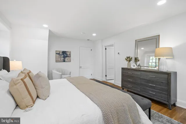 a white bath tub sitting in a bathroom