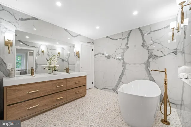 a room with a window and a white cabinet