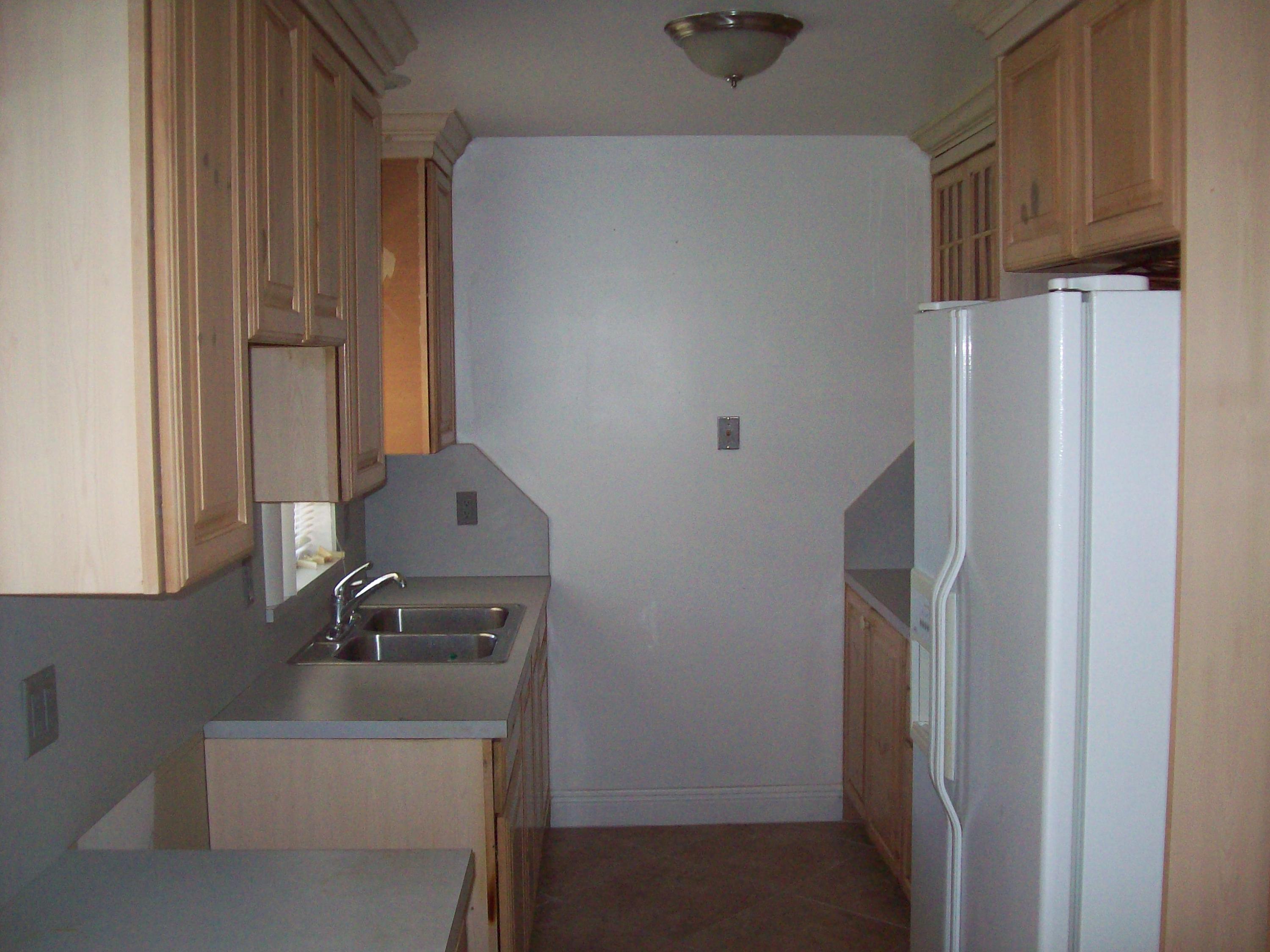 1236 Highview Road Lantana, FL 33462 - Photo 8 of 12 a bathroom with a sink and a mirror