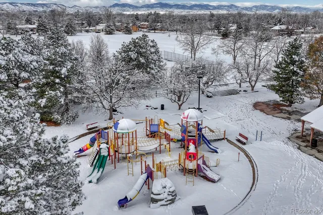 an aerial view of a yard with horses
