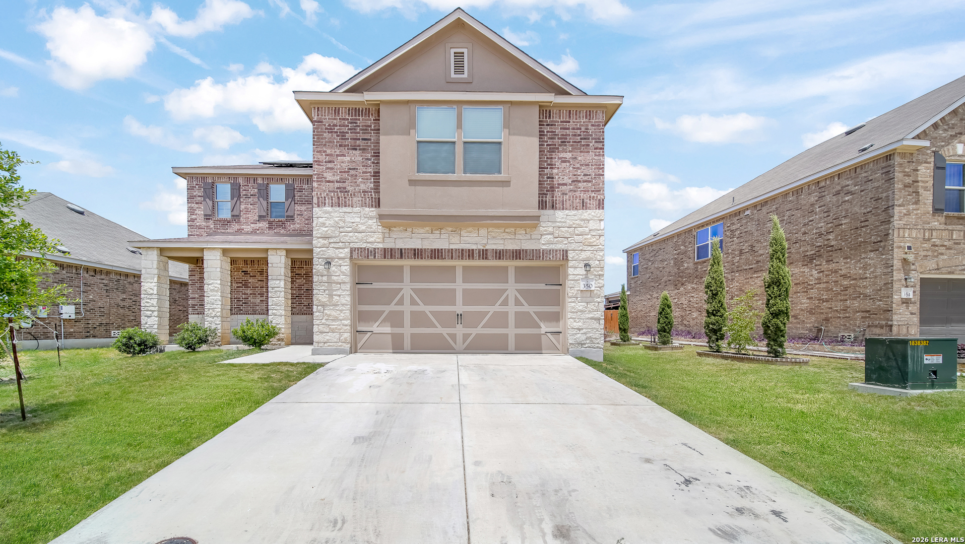 350 Colonial Bluff Universal City, TX 78148 - Photo 1 of 27 a front view of a house with a yard