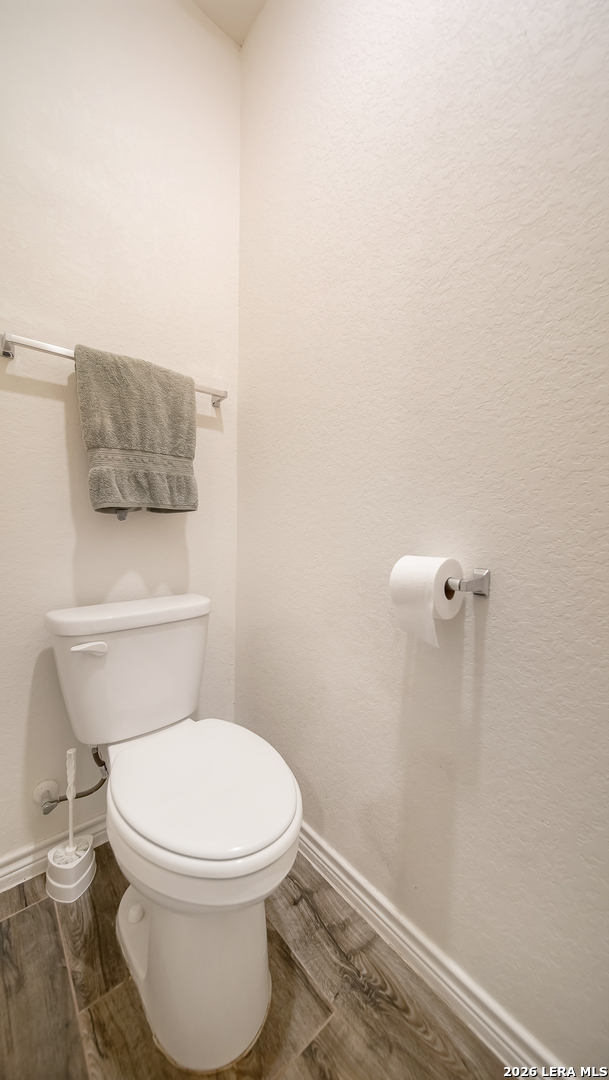 350 Colonial Bluff Universal City, TX 78148 - Photo 12 of 27 a white toilet sitting next to a shower