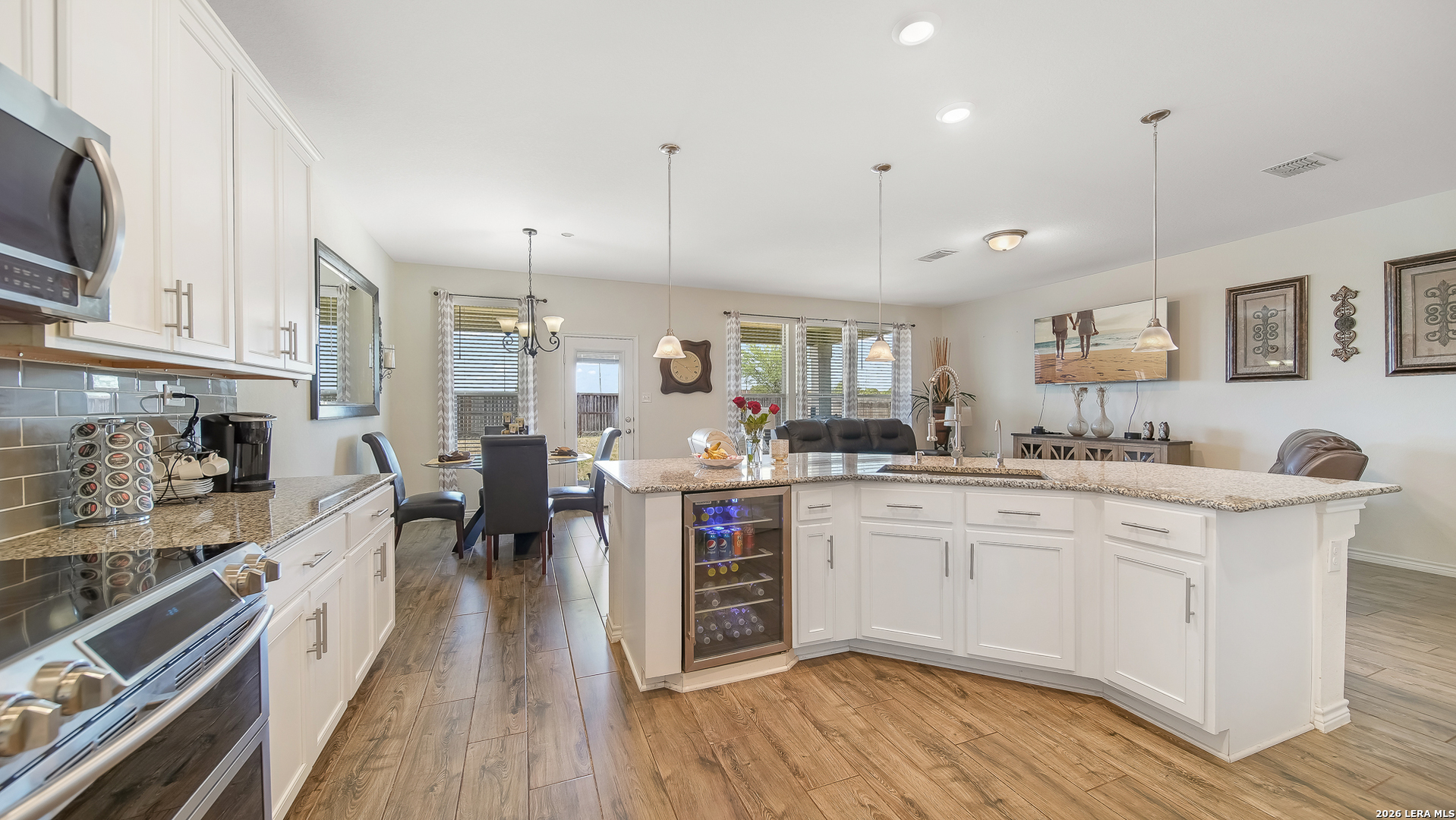 350 Colonial Bluff Universal City, TX 78148 - Photo 13 of 27 a large kitchen with stainless steel appliances lots of counter space and a sink