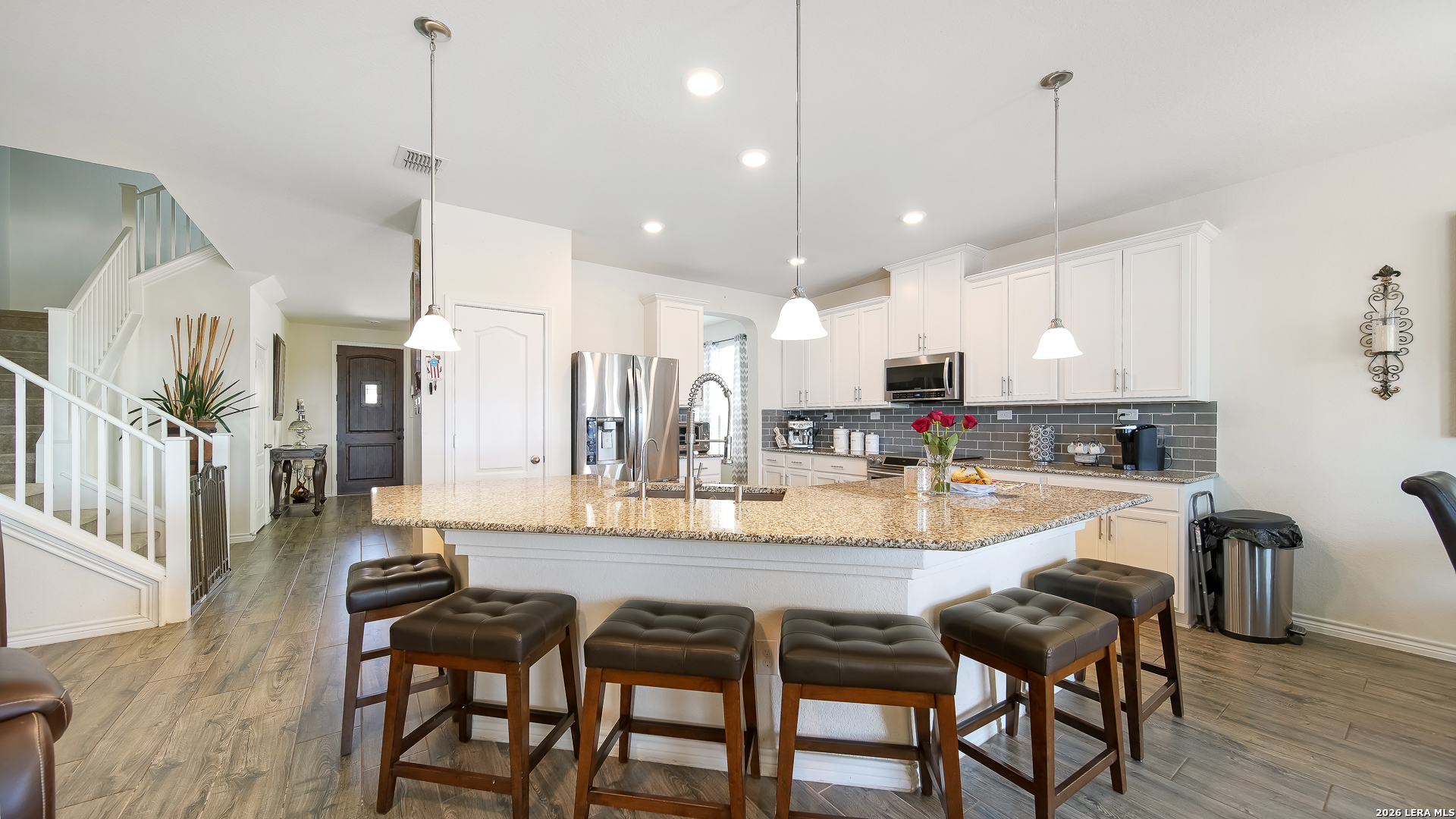 350 Colonial Bluff Universal City, TX 78148 - Photo 17 of 27 a large kitchen with a table and chairs