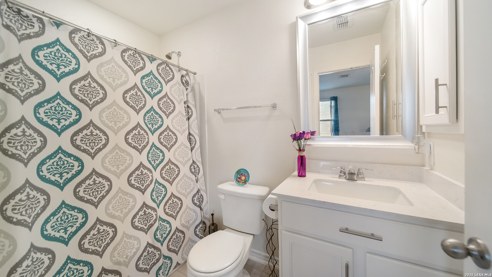350 Colonial Bluff Universal City, TX 78148 - Photo 18 of 27 a bathroom with a sink mirror vanity and toilet