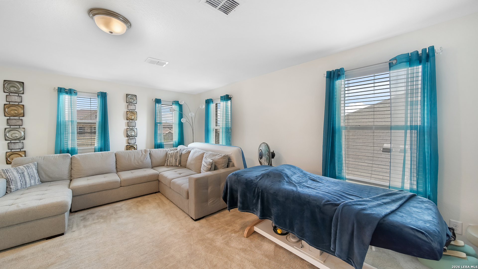 350 Colonial Bluff Universal City, TX 78148 - Photo 19 of 27 a bedroom with furniture and a large window
