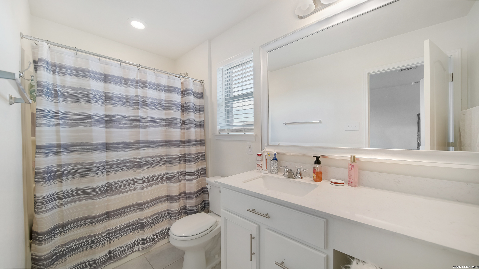 350 Colonial Bluff Universal City, TX 78148 - Photo 24 of 27 a bathroom with a sink a toilet and a shower