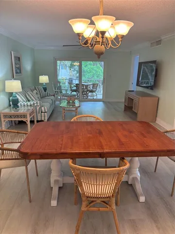 a view of a dining room with furniture
