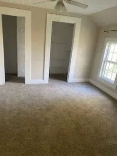 an empty room with windows