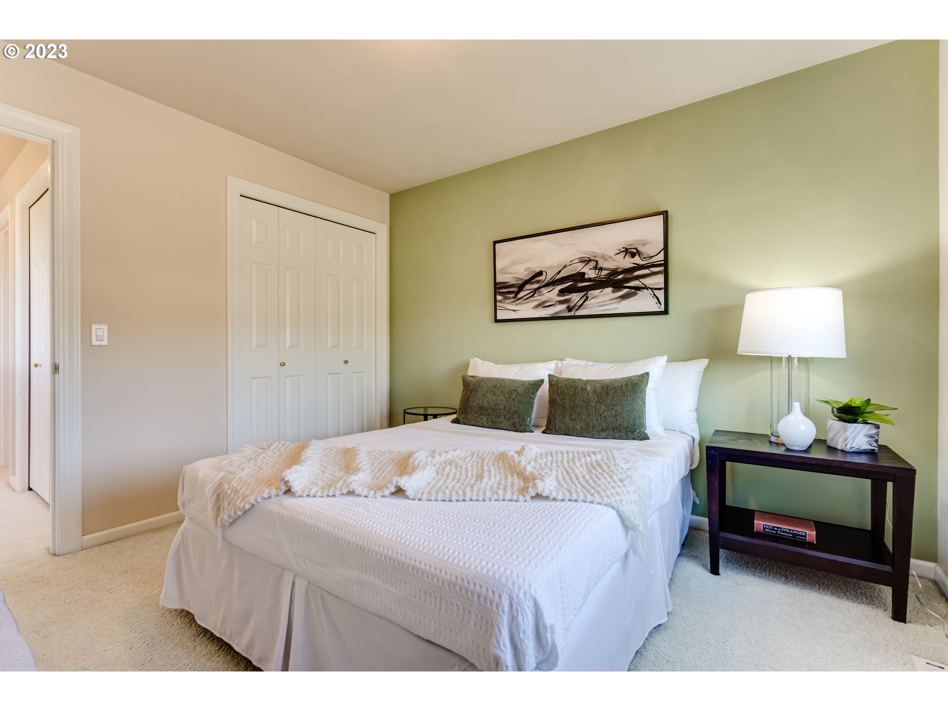 2572 Walnut Ridge Drive Springfield, OR 97477 - Photo 23 of 47 a bedroom with a bed and a painting on the wall