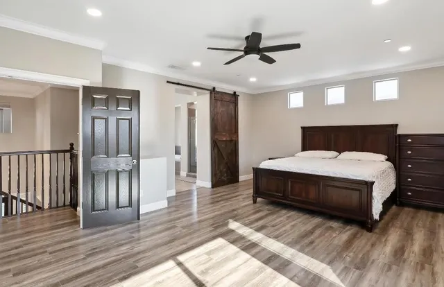 a bathroom with a tub and shower