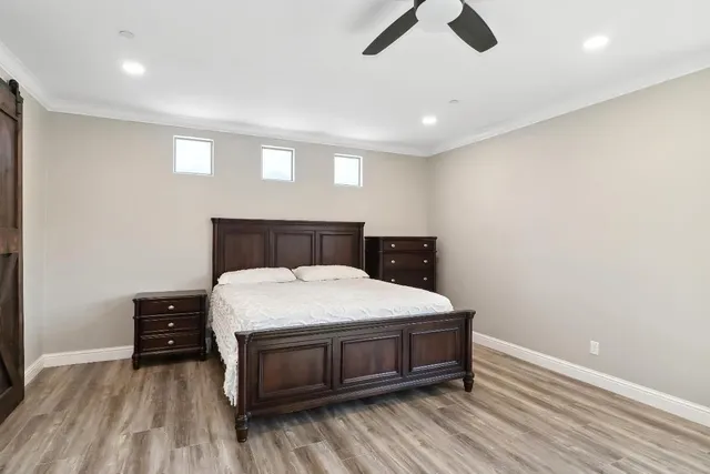 a bathroom with a tub and a window