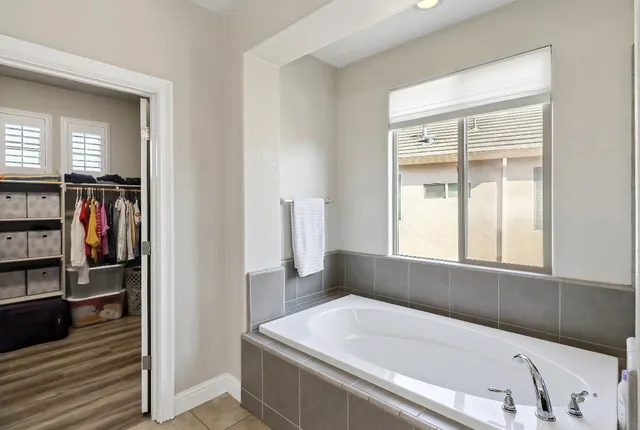 a utility room with sink dryer and washer