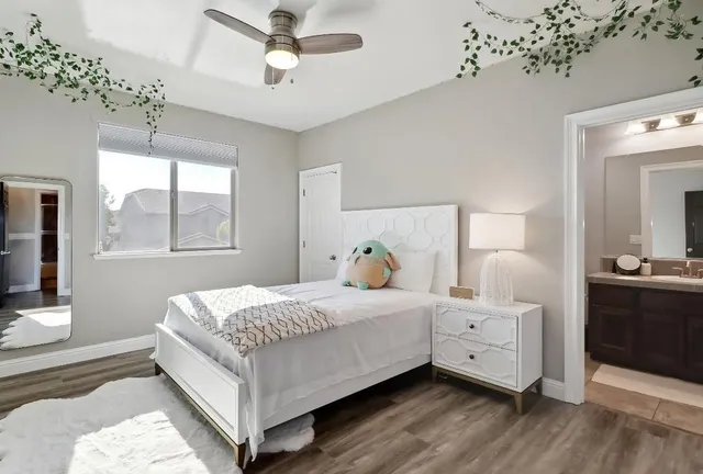 a view of a house with swimming pool and sitting area