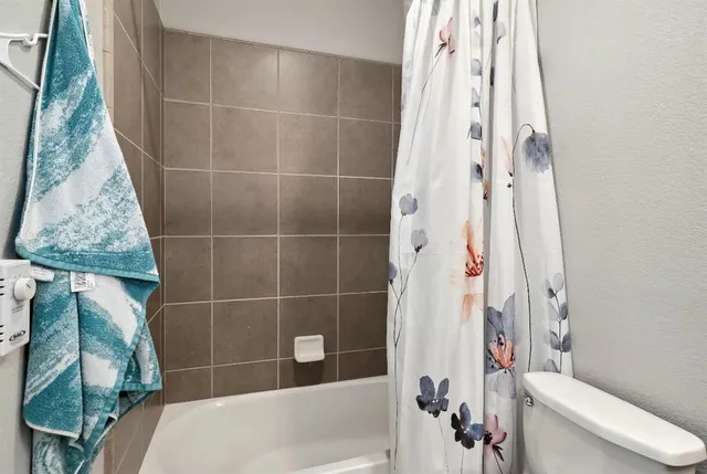 a swimming pool with outdoor seating and outdoor seating