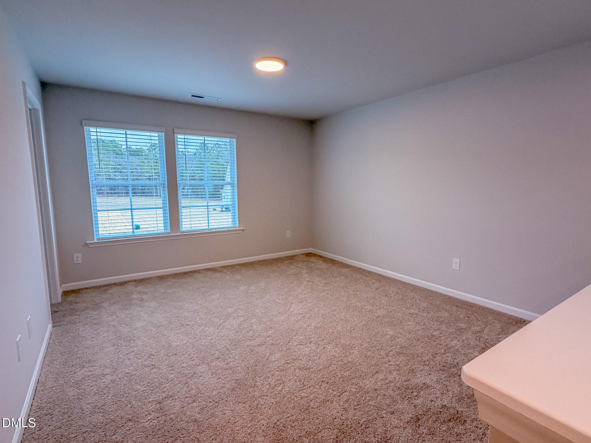 460 Beacon Hl Road Lillington, NC 27546 - Photo 22 of 48 an empty room with a window