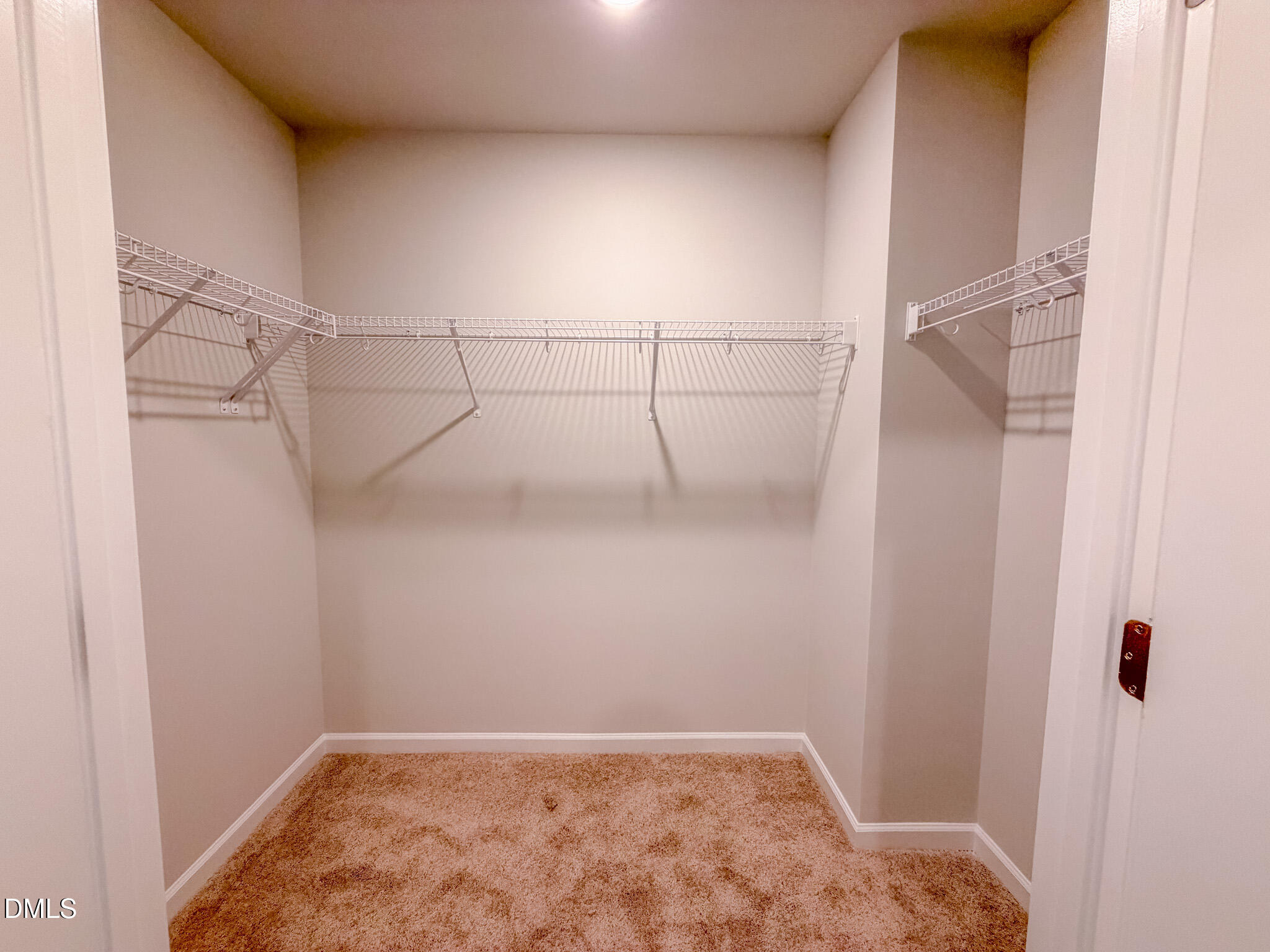 460 Beacon Hl Road Lillington, NC 27546 - Photo 30 of 48 a view of a room with racks on the wall