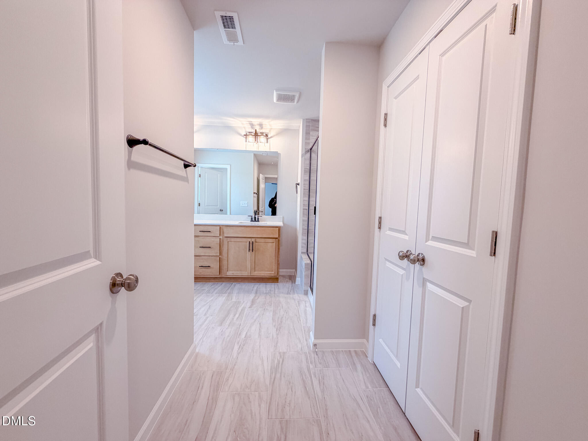 460 Beacon Hl Road Lillington, NC 27546 - Photo 31 of 48 a view of a bathroom with a sink and mirror