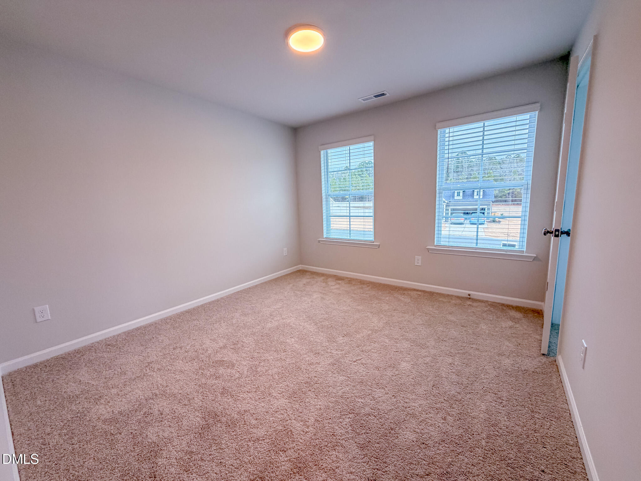 460 Beacon Hl Road Lillington, NC 27546 - Photo 39 of 48 an empty room with windows
