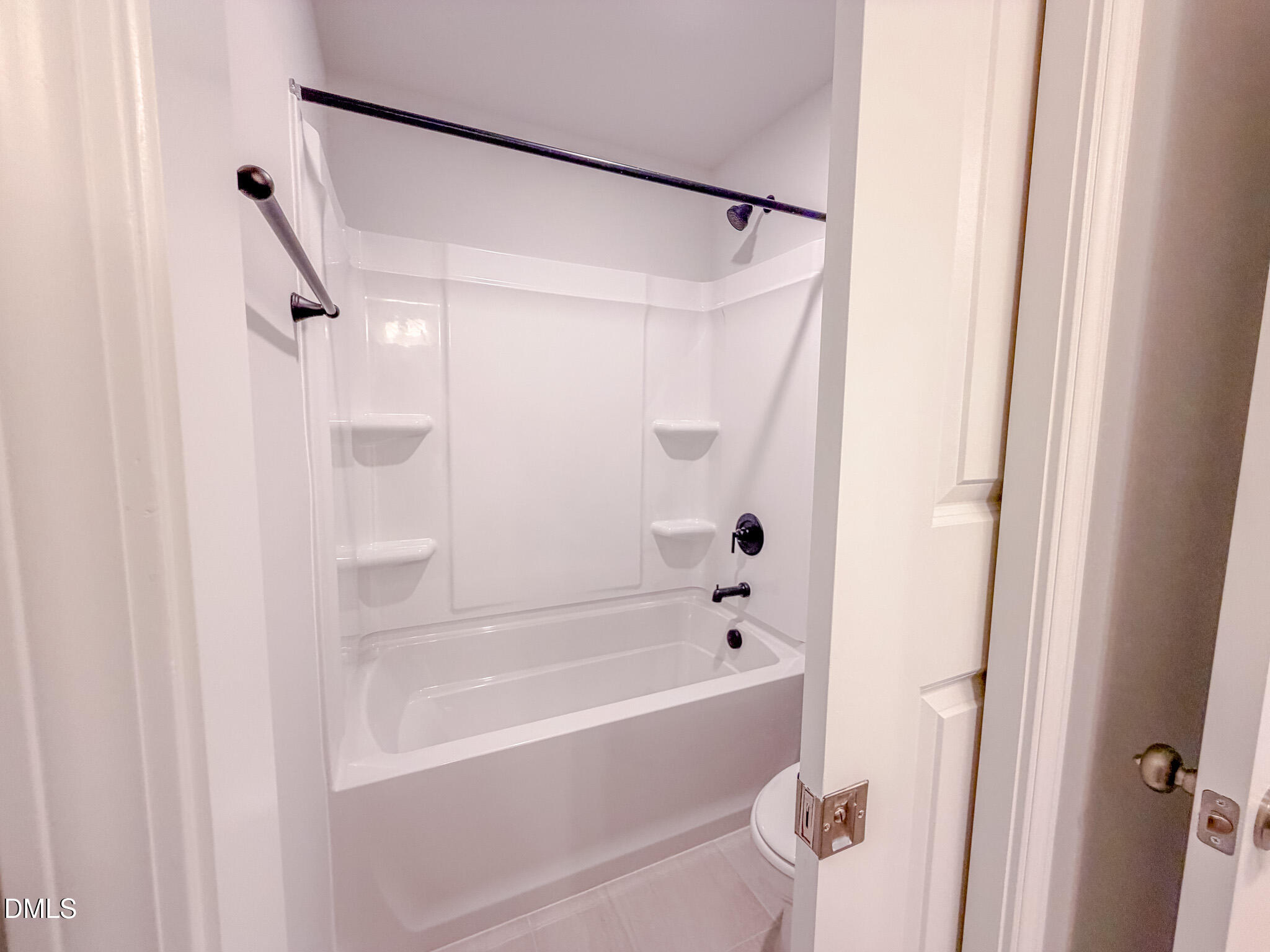 460 Beacon Hl Road Lillington, NC 27546 - Photo 44 of 48 a bathroom with a bathtub and a shower