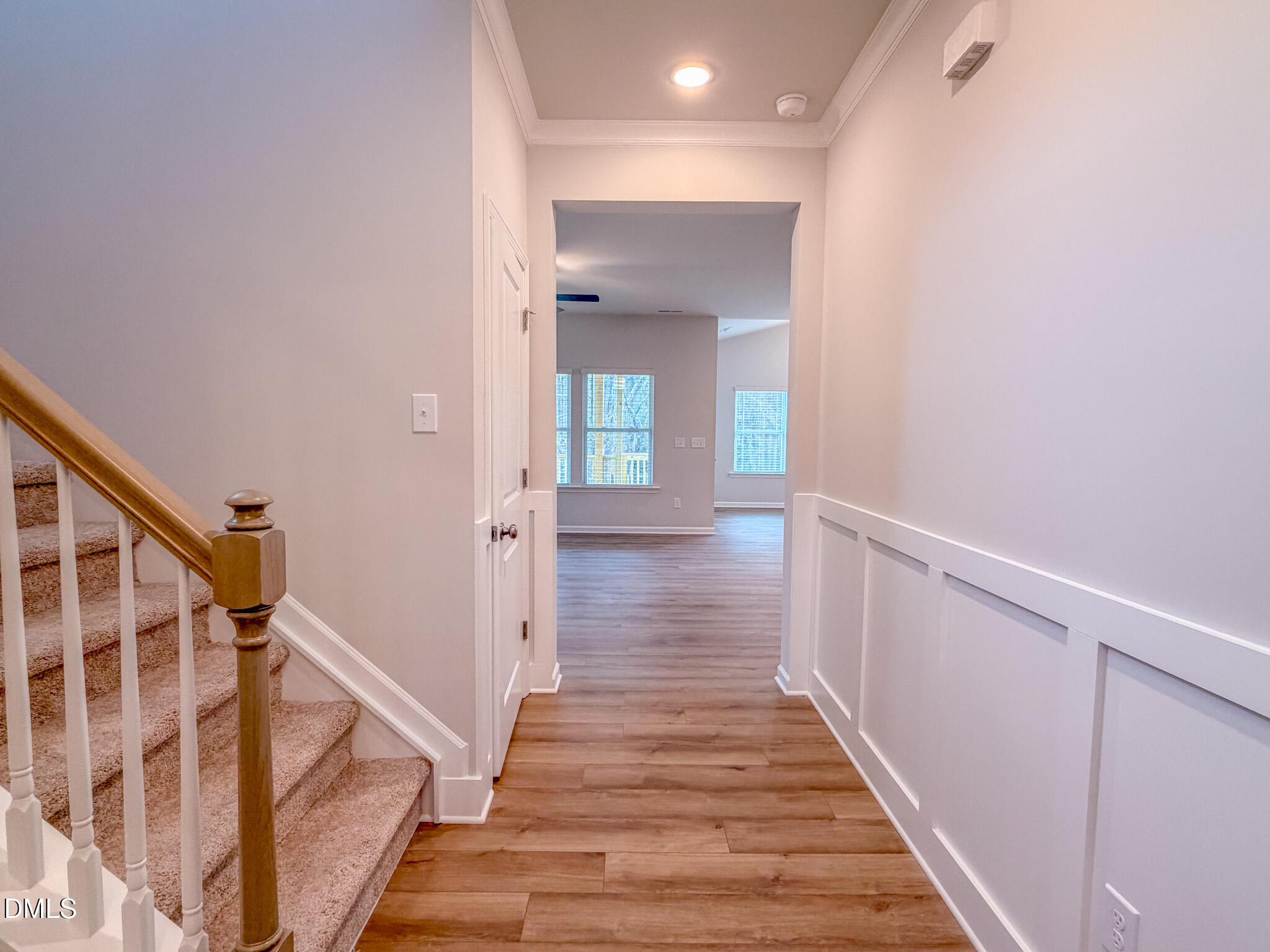 460 Beacon Hl Road Lillington, NC 27546 - Photo 10 of 48 a view of a hallway with wooden floor and staircase