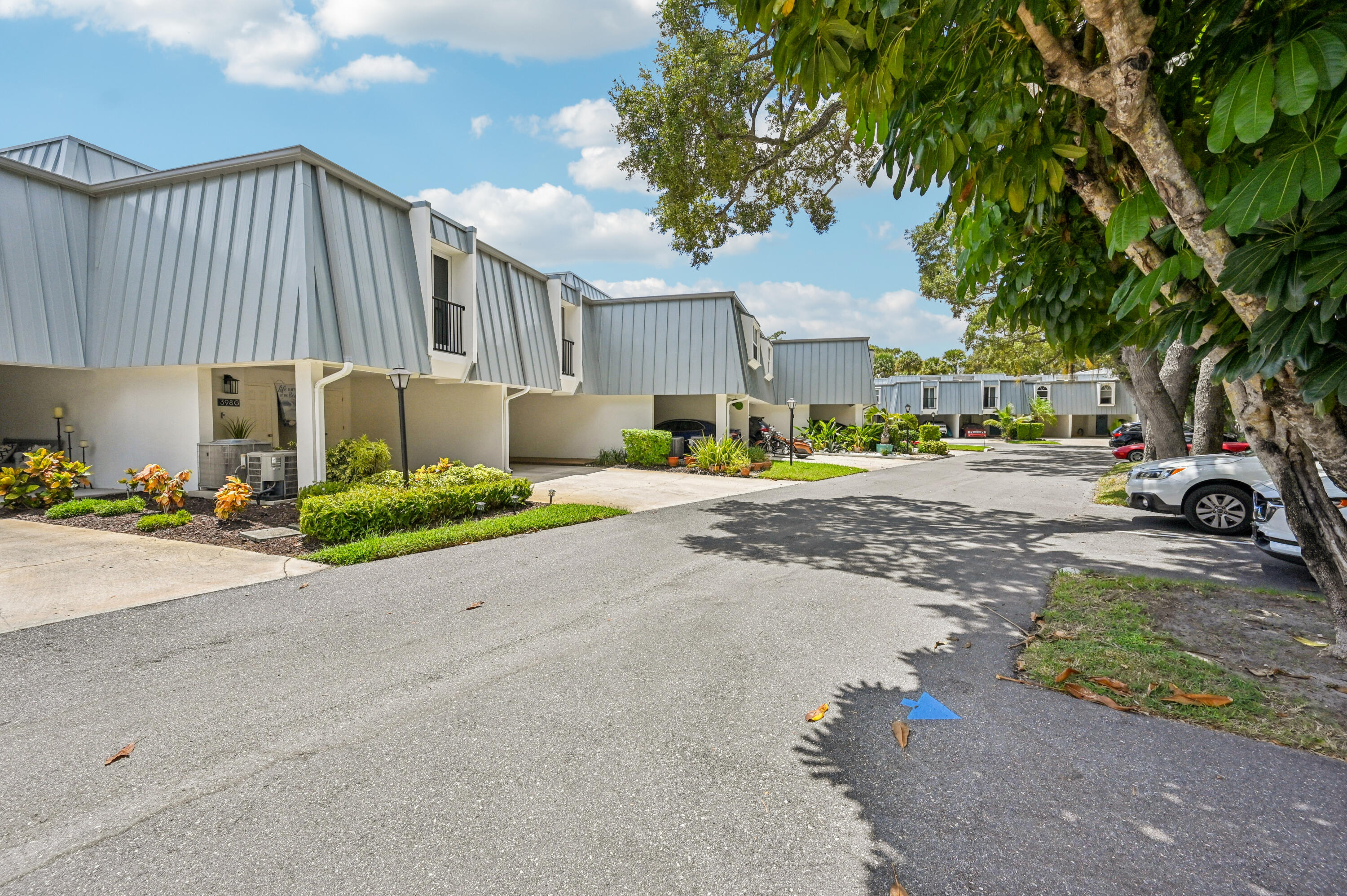 398 Golfview Road, Unit G North Palm Beach, FL 33408 - Photo 3 of 48 3-Tree Lined Streets