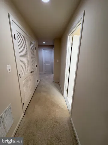 a view of empty room with windows