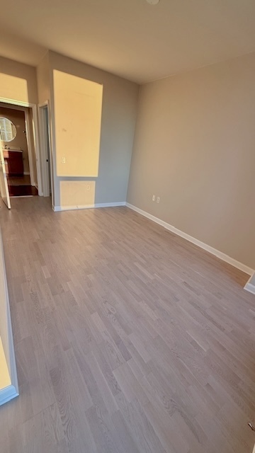 1235 South Prairie Avenue, Unit 3206 Chicago, IL 60605 - Photo 12 of 46 an empty room with a window