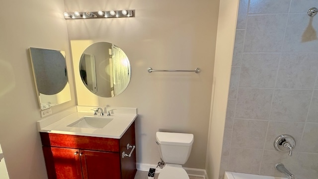 1235 South Prairie Avenue, Unit 3206 Chicago, IL 60605 - Photo 17 of 46 a bathroom with a sink mirror and toilet