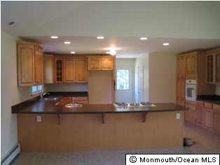 895 Hurley Road Jackson, NJ 08527 - Photo 3 of 3 a view of a living room and kitchen