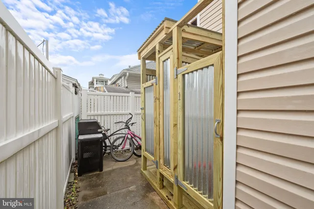 a view of a balcony with furniture