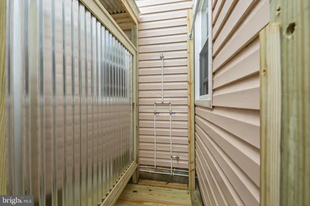 a view of a door and a window