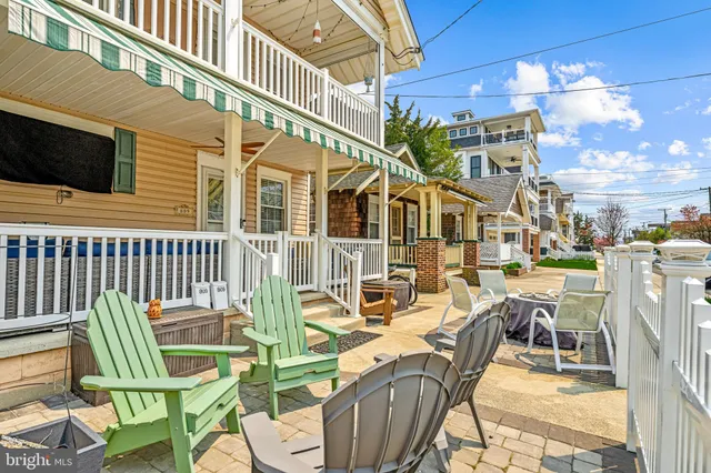 a view of a chairs and table in a patio